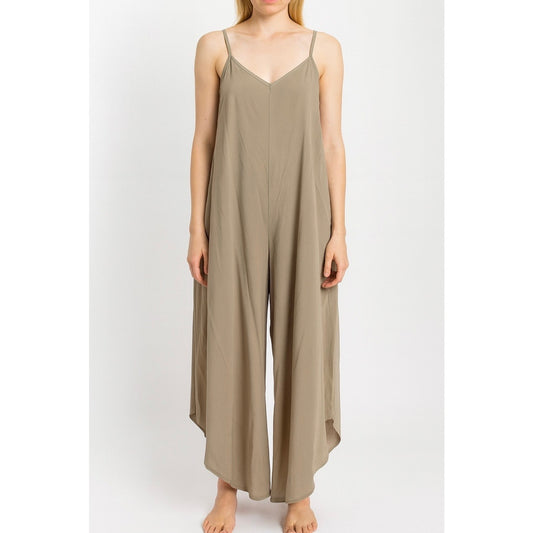 WASHED WOVEN SLOUCHY FITTED JUMPSUIT WITH CAMI STRAP. MADE IN USA