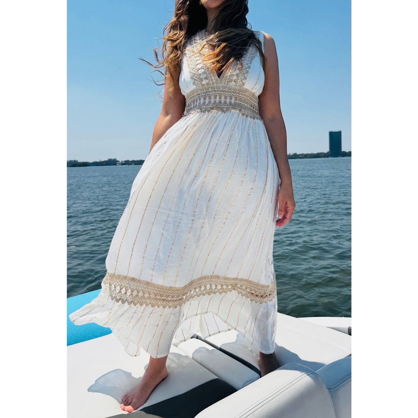 Elegant Long White Dress with Gold Accents and Braided Rope Detailing