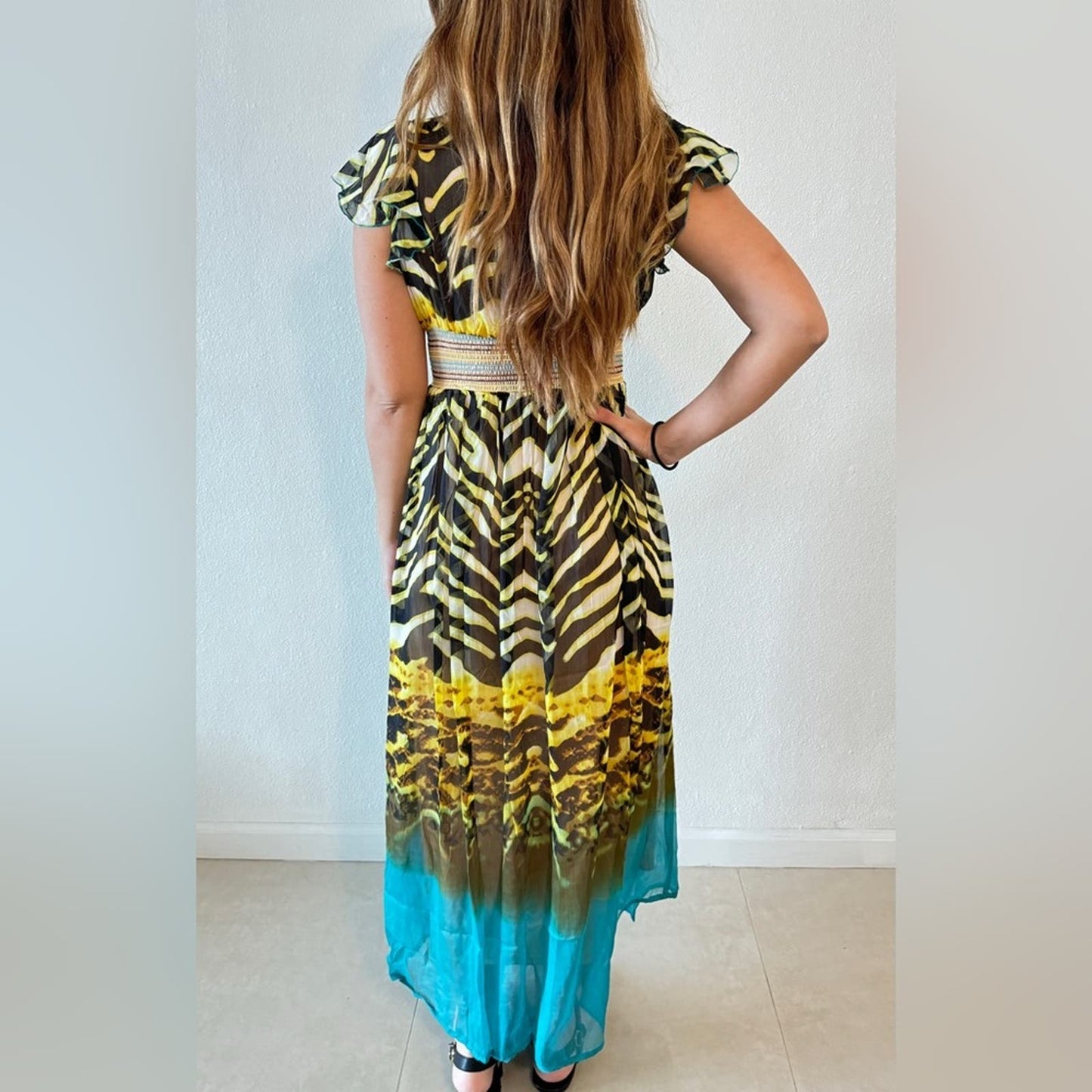 Maxi turquoise and beige animal print Dress