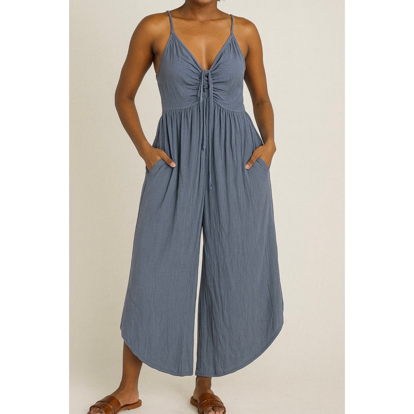 WOVEN SOLID FRONT RUCHED ROUND HEMMING MIDI JUMPSUIT.