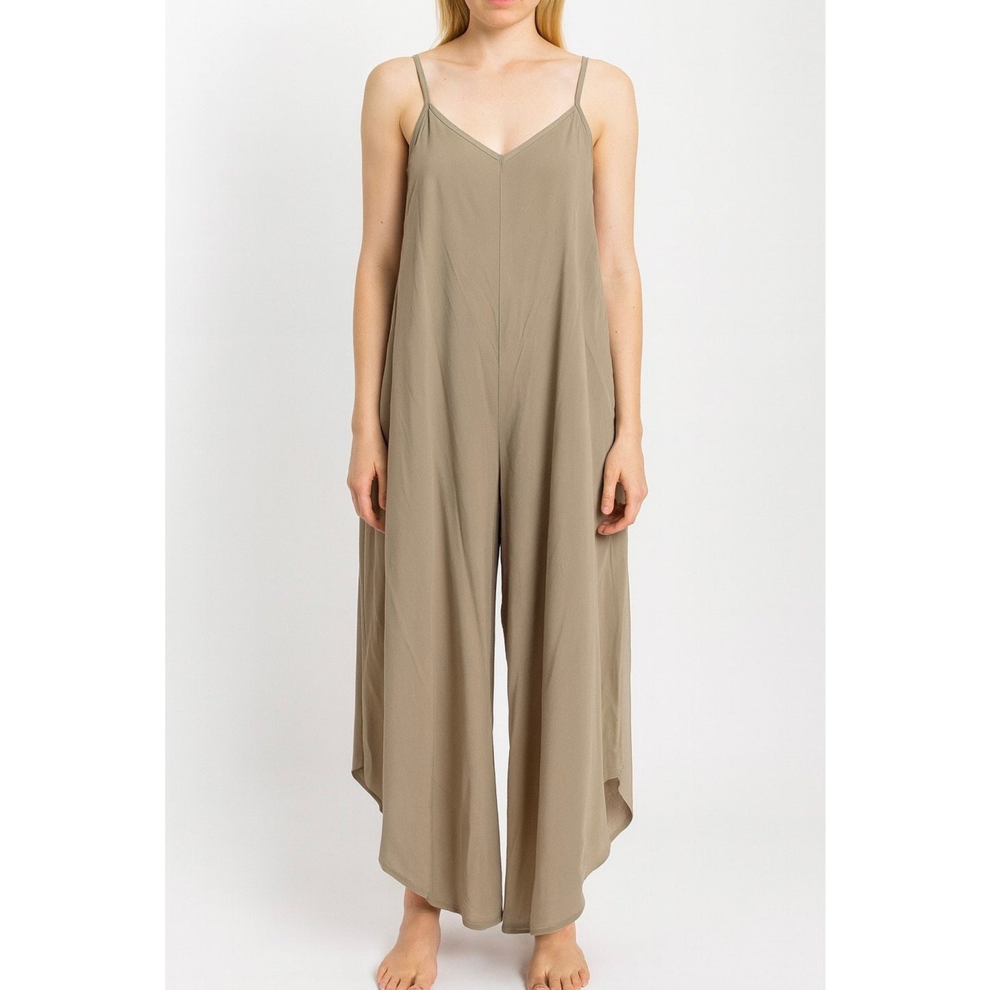 WASHED WOVEN SLOUCHY FITTED JUMPSUIT WITH CAMI STRAP. MADE IN USA