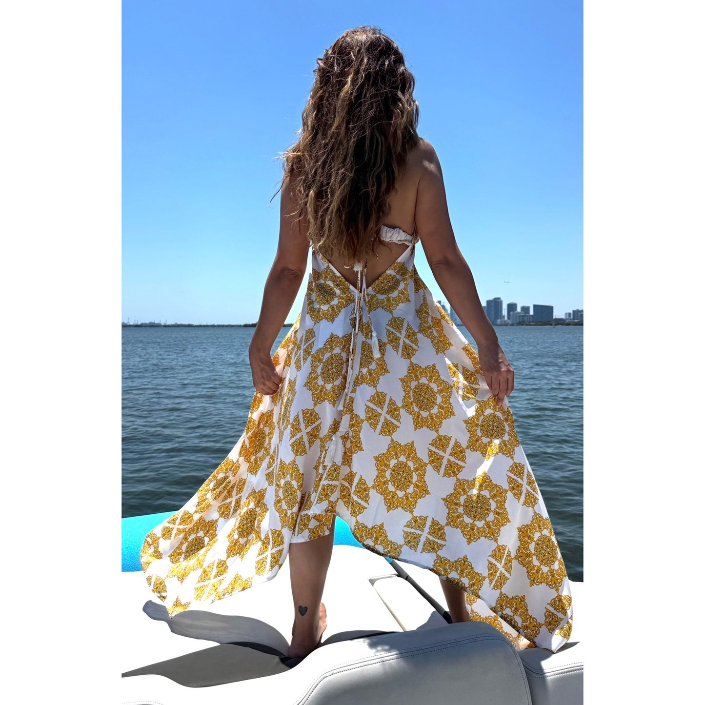 Short gold floral paisley scarf dress cover-up featuring an open back and deep V-neck