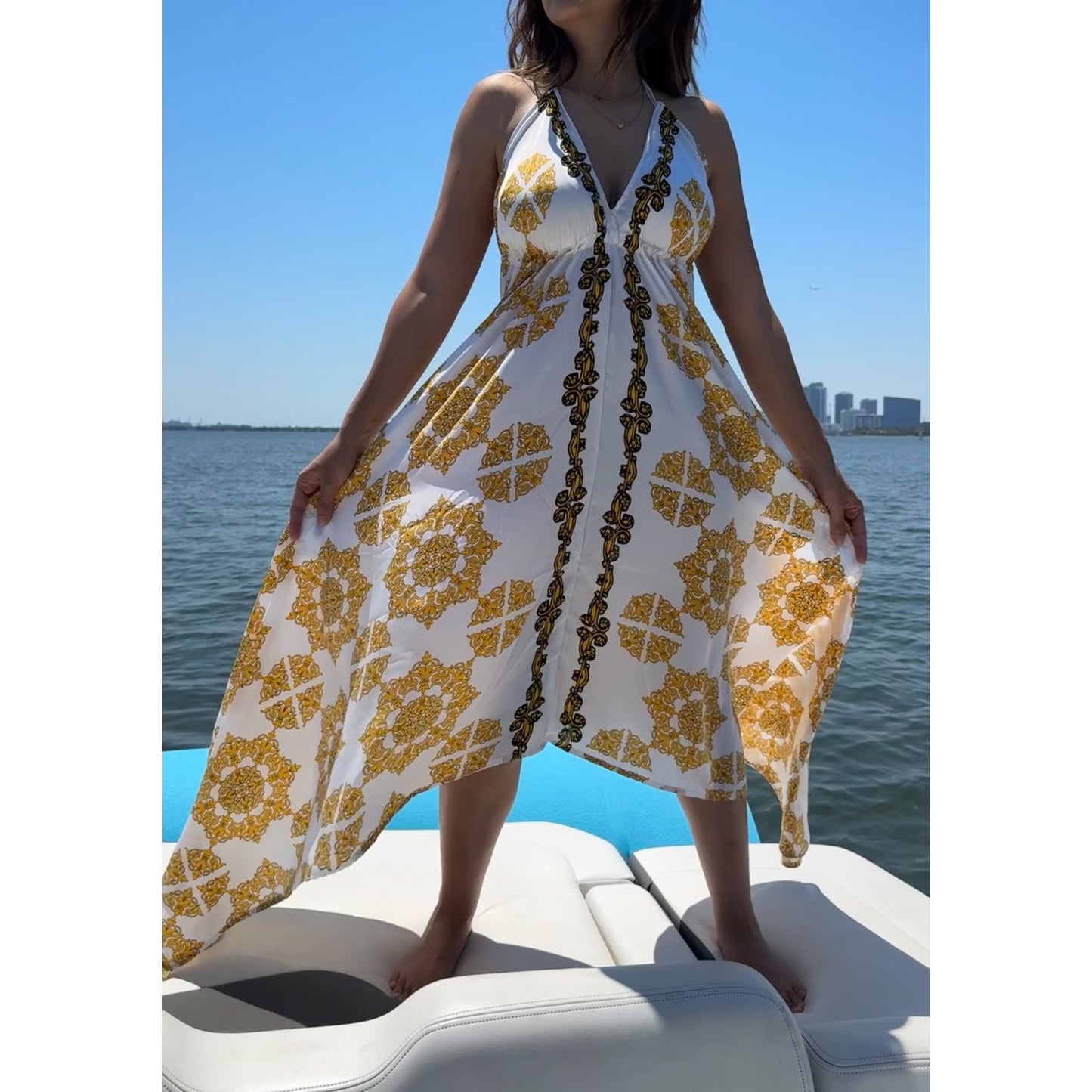 Short gold floral paisley scarf dress cover-up featuring an open back and deep V-neck