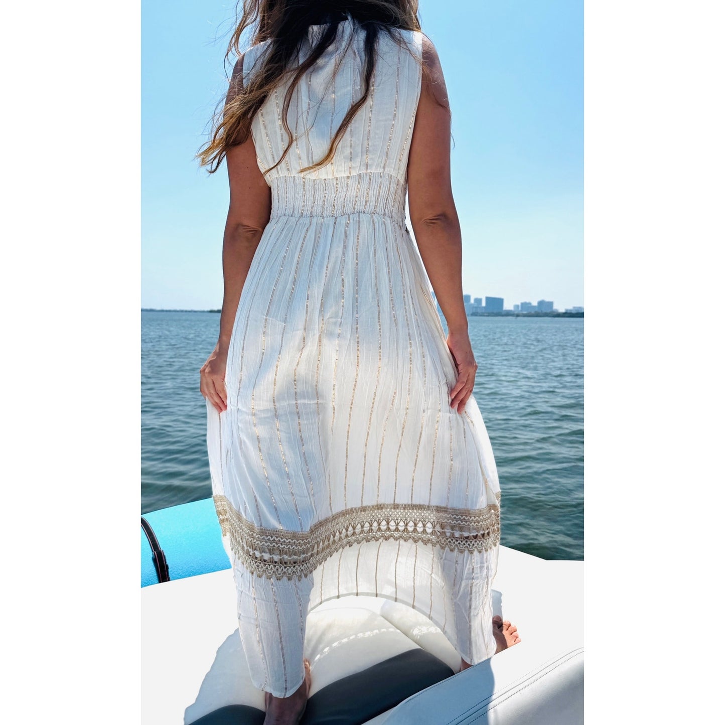 Elegant Long White Dress with Gold Accents and Braided Rope Detailing
