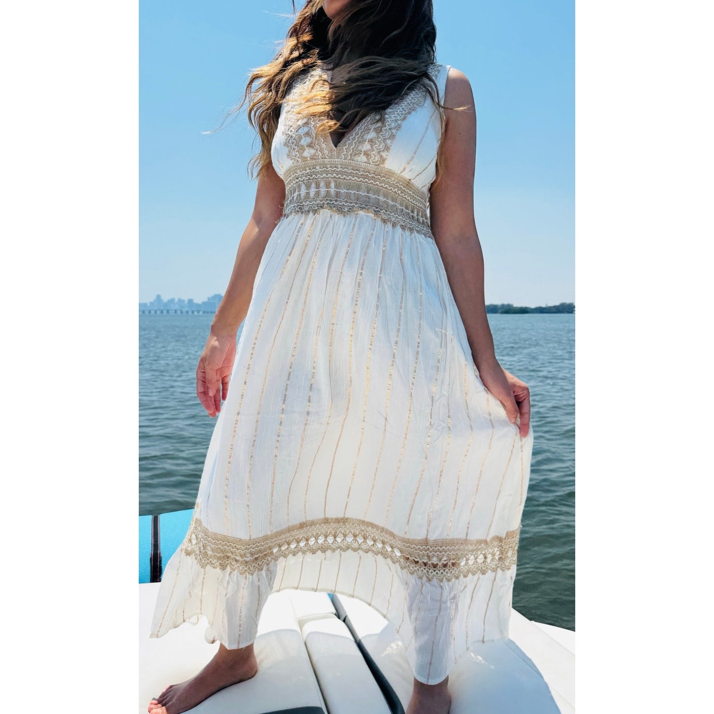 Elegant Long White Dress with Gold Accents and Braided Rope Detailing